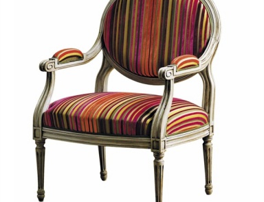 A chair on a frame of solid beech upholstered Adam Roche Bobois