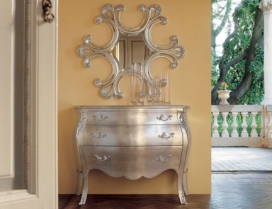 A chest of drawers on high legs, Como - Minotti Luigi & Benigno