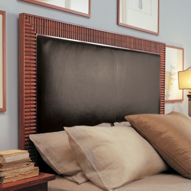 Bed with upholstered headboard