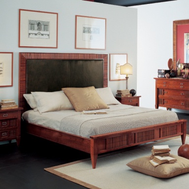 Bed with upholstered headboard