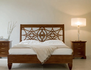 Double bed with decorative headboard, Bruno Piombini
