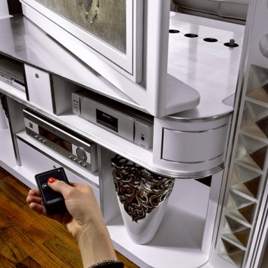 The panel under the TV Revolving Home Cinema