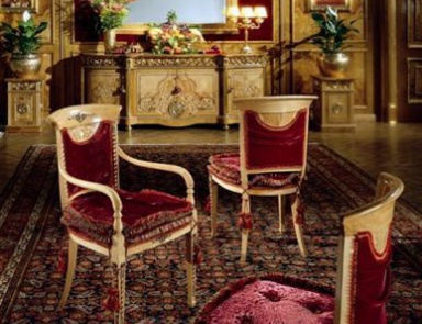 A chair with soft upholstery, Emergroup