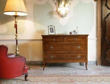 A chest of drawers on high legs, the Ca' d'oro