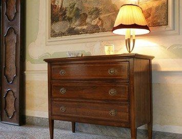 A chest of drawers on high legs, the Ca' d'oro