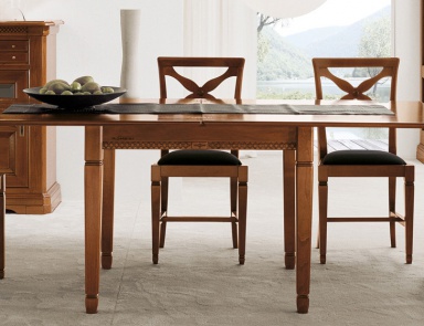 A chair on a frame of solid beech upholstered in leather or fabric 4142, Bruno Piombini