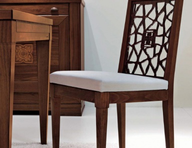 A chair on a frame of beech upholstered in leather or fabric 8052, Bruno Piombini