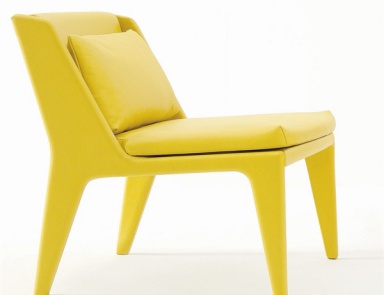 A chair with a filler and a coating of foam and the metal frame of the Delta, Arflex