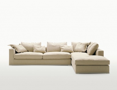 Three seater sofa on a metal frame upholstered in leather or fabric Omnia, B&B Italia