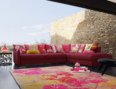 The sofa is modular, Khanami - Roche Bobois