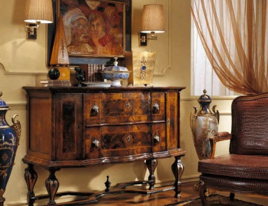 A chest of drawers on high legs, Palmobili