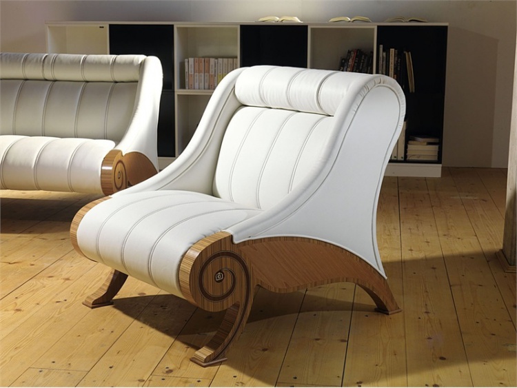 A chair on a frame of solid walnut with leather or fabric upholstery PO27, Carpanelli