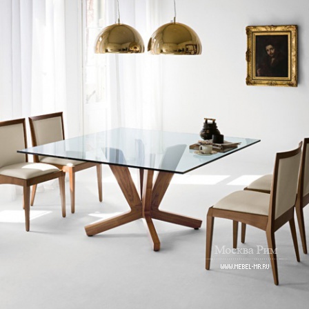 The table on the basis of solid walnut or oak with glass top Goblin, a Cattelan Italia