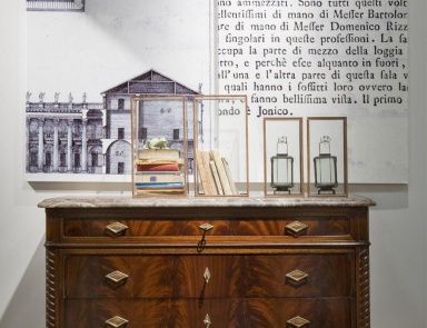 A chest of drawers on high legs, Annibale Colombo