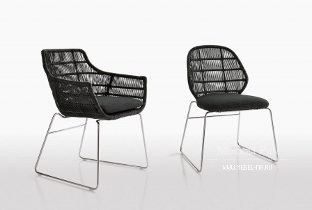 The chair is woven from plastic threads Crinoline, B&B Italia