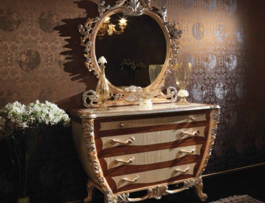 A chest of drawers made from natural wood, Ezio Bellotti