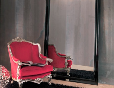 A chair with a high back Carved armchair, Bizzotto