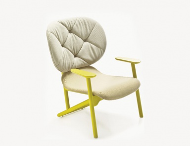 The Klara armchair with a frame made of beech wood, Moroso