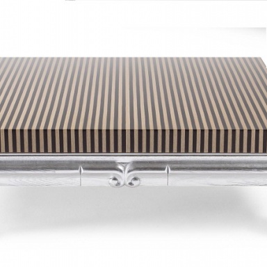 The work was first performed in a coffee table