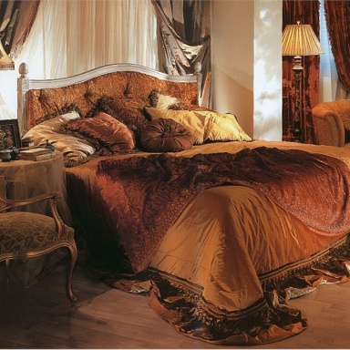 Double bed with upholstered headboard