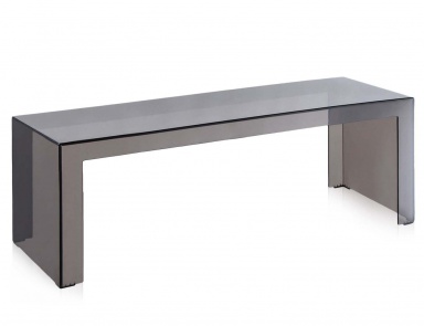 The console is Invisible polycarbonate, Kartell