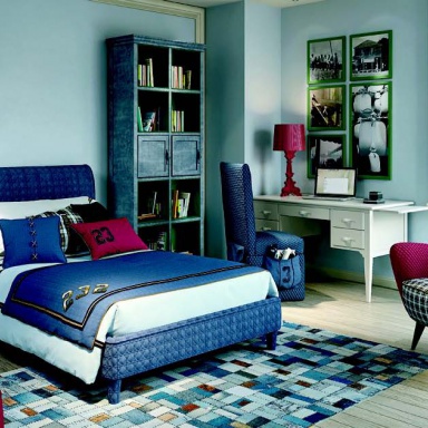 Bed made of solid wood in the upholstery fabric in blue Burton