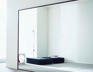 A mirror mounted on a metal frame, Reflection - Porro