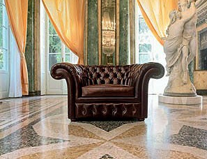 Armchair upholstered in leather Rojal, Mascheroni