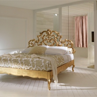 Bed with filigree headboard