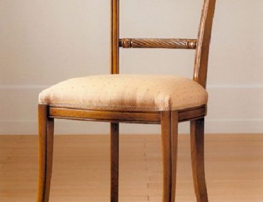 A chair with soft upholstery, PREGNO