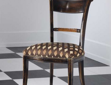 A chair with soft upholstery, PREGNO