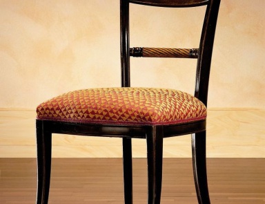 A chair with soft upholstery, PREGNO